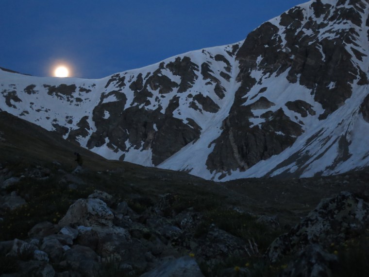 Gorgeous views often come with early starts. The moon sets over the saddle between Grays and Torreys peaks.