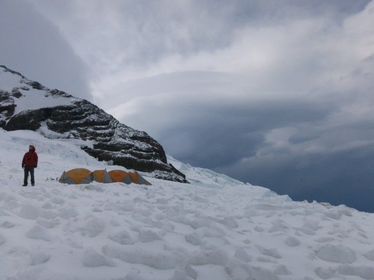 My father-in-law Peter checks out the spectacular post-storm clouds.
