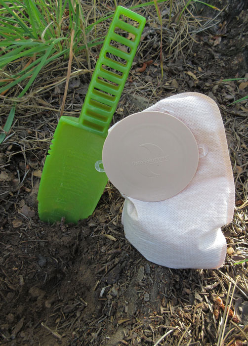 I can snap an OstoSolution Seal on my pouch at night and then pop it off later to empty the contents into a cathole (a six-inch deep hole dug in the ground.)